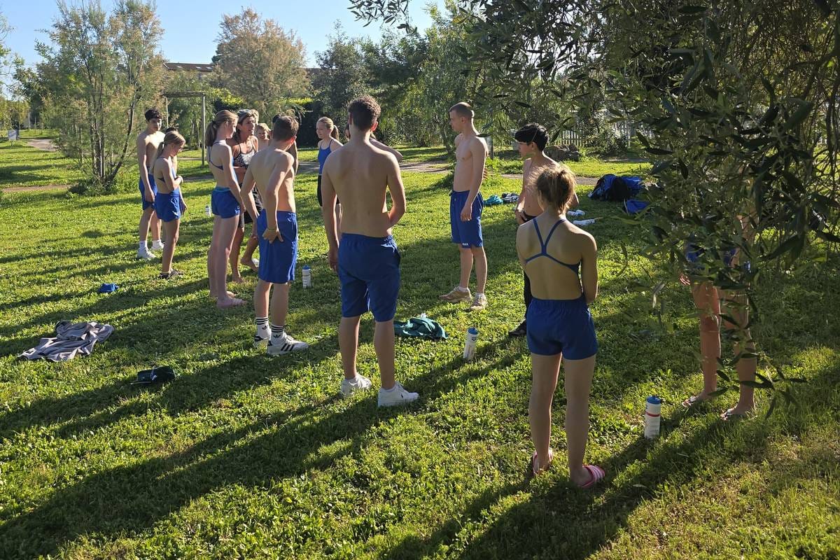 Swimmers doing dryland training during a camp day